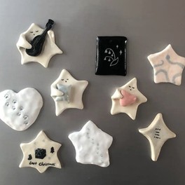 Hand-finished clay star ornaments