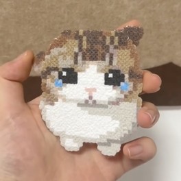 Pixel-art cat made from fuse beads