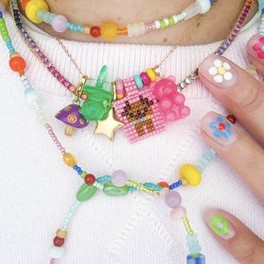 Colourful beaded necklaces with charms